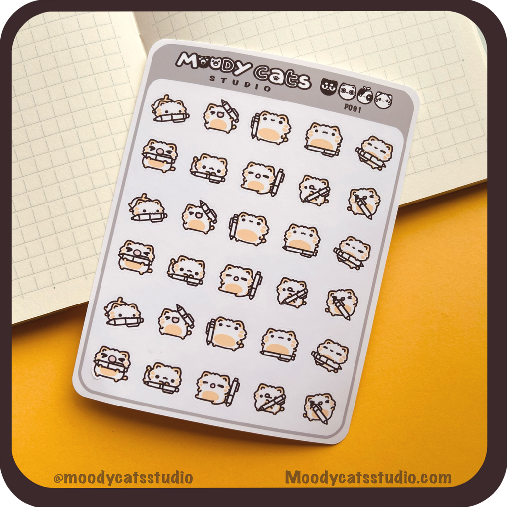 Sticker sheet of a ginger cat with pens