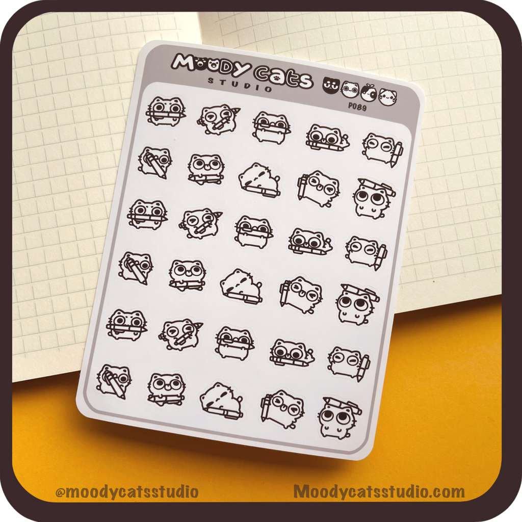 Sticker Sheet of a white cat with pens